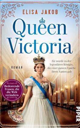 Queen Victoria Das Buchcover zeigt eine elegant gekleidete Frau in historischen Kleidern, die Queen Victoria darstellen soll. Ihre Krone und der blaue Sash verleihen ihr ein majestätisches Aussehen. Der Hintergrund zeigt eine opulente Innenarchitektur, die eine klassische Atmosphäre schafft. Der Titel „Queen Victoria“ ist in großen, hellblauen Buchstaben platziert, während der Name der Autorin „Elisa Jakob“ darüber in kleinerer Schrift erscheint. Unten links befindet sich ein rot-violetter Button mit dem Text „Bedeutende Frauen, die die Welt verändern“.