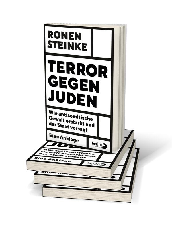 Bücherstapel des Buches „Terror gegen Juden“