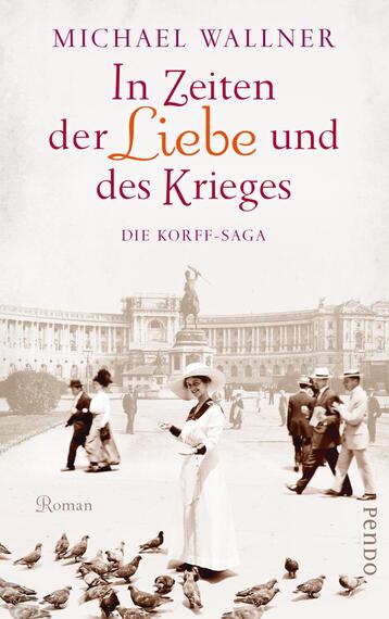 Das Buchcover zeigt eine historische Szenerie mit einer eleganten Frau in einem weißen Kleid und einem modischen Hut, die im Vordergrund steht. Im Hintergrund sind Menschen in historischer Kleidung sowie eine monumentale Architektur zu sehen, die eine nostalgische Atmosphäre vermittelt. Der Titel „In Zeiten der Liebe und des Krieges“ wird in geschwungener, orangefarbener Schrift hervorgehoben, während der Autorenname „Michael Wallner“ in klassischer, dunkler Typografie darüber platziert ist. Am unteren Rand steht „Die Korff-Saga“ in einer kleineren Schriftgröße.