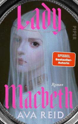 Lady Macbeth Das Buchcover zeigt ein oval gerahmtes Porträt einer blassen Frau mit langen weißen Haaren und durchscheinendem Schleier, ihr Blick melancholisch und geisterhaft. Farben dominieren helles Porzellanweiß, düsteres Grünoliv und ein silberner Rahmen. Der Titel „Lady Macbeth“ steht in großen, leuchtend pinken, gotisch anmutenden Lettern; darunter der Autorenname Ava Reid in weißen Großbuchstaben. Auf der rechten Seite ein oranger Aufkleber mit dem Text „SPIEGEL Bestseller-Autorin“. Klein steht „Roman“.