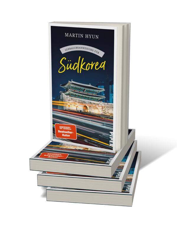 Bücherstapel des Buches „Gebrauchsanweisung für Südkorea“