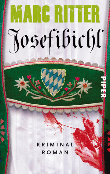 Das Buchcover zeigt einen farbenfrohen Hintergrund mit einem zarten weißen Stoff, auf dem ein grünes, mit Blumen und einem bayerischen Wappen verziertes Band verläuft. Der Titel „Josefibichl“ steht in elegant geschwungener Schrift in Schwarz, während der Autorennamen „Marc Ritter“ in kräftigem Grün darüber prangt. Unter dem Titel befindet sich der Zusatz „Kriminal Roman“ in schlichterer Schrift. Ein blutroter Farbspritzer am unteren Rand vermittelt eine spannungsgeladene Atmosphäre.