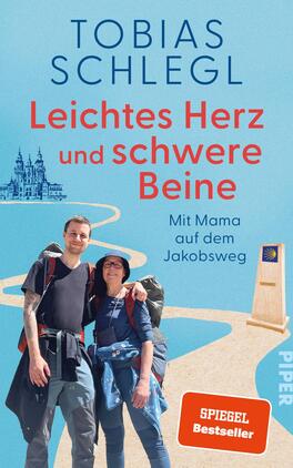Leichtes Herz und schwere Beine Das Buchcover zeigt zwei Wanderer, einen jungen Mann und eine Frau, die eng zusammenstehen. Beide tragen Rucksäcke und sind in Wanderkleidung. Der Hintergrund zeigt eine Illustration einer Stadtansicht mit Türmen und einer geschwungenen Linie, die den Jakobsweg symbolisiert. Der Titel „Leichtes Herz und schwere Beine“ ist in großen, bunten Buchstaben dargestellt, wobei „Herz“ in Rot hervorsticht. Der Autorenname „Tobias Schlegl“ steht oben in blauer Schrift. Unten rechts befindet sich das Wort „SPIEGEL Bestseller“ in kleinerer Schrift.