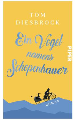 Ein Vogel namens Schopenhauer Das Buchcover zeigt einen leuchtend gelben Hintergrund mit einem stilisierten blauen Hügel am unteren Rand. In der Mitte steht der Titel „Ein Vogel namens Schopenhauer“ in schwungvoller Schrift, die das Gefühl von Leichtigkeit vermittelt. Darunter ist der Autorenname „Tom Diesbrock“ in einer schlichteren, eleganten Schriftart angeordnet. Rechts unten befindet sich das Wort „ROMAN“ in einer einfachen Schrift. Der Verlagshinweis „PIPER“ ist in vertikaler Position auf der rechten Seite platziert.