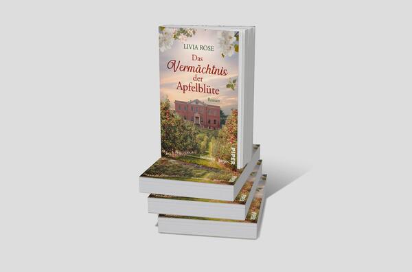 Bücherstapel des Buches „Das Vermächtnis der Apfelblüte“