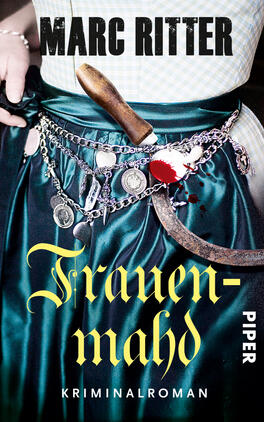 Frauenmahd Das Buchcover zeigt einen ausladenden, schimmernden, türkisfarbenen Rock, der von einem silbernen Gürtel mit verschiedenen Anhängern geschmückt wird. Darin steckt ein Dolch, dessen Klinge blutverschmiert ist. Der Titel „Frauenmahd“ ist in einer eindringlichen, geschwungenen Schrift in Gelb gehalten. Der Autorenname „Marc Ritter“ steht in großem, fettem Schwarz am oberen Rand, während das Wort „Kriminalroman“ dezent in einer schmalen Schrift am unteren Rand in Weiß erscheint. Der gesamte Eindruck vermittelt eine düstere, spannungsgeladene Atmosphäre.