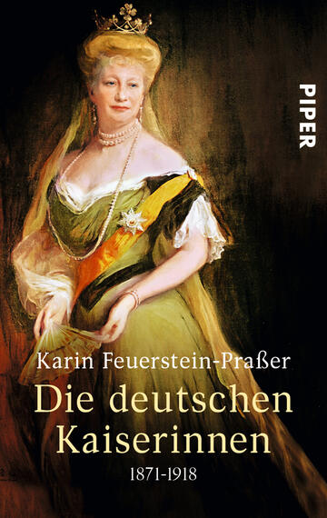 Das Buchcover zeigt ein Portrait einer eleganten Frau in farbenfroher, historischer Kleidung. Sie trägt eine klassische Tiara und eine prachtvolle Robe in Grün, Schwarz und Goldtönen, die ihren Status widerspiegelt. Der Hintergrund ist in sanften, warmen Farben gehalten, was eine nostalgische Atmosphäre schafft. Der Titel „Die deutschen Kaiserinnen 1871-1918“ ist in goldenen Buchstaben prominent platziert, während der Autorennamen „Karin Feuerstein-Prässer“ in kleinerer Schrift darunter erscheint.