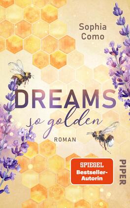 Dreams so golden Das Buchcover zeigt einen sanften, hellen Hintergrund in Gelbtönen, der an Honig erinnert. Im oberen Bereich steht der Name der Autorin „Sophia Como“. Der Titel „DREAMS so golden“ ist in einer auffälligen, modernen Schriftart in dunklem Violett gehalten, während der Untertitel „Roman“ in einem schlichten Stil darunter platziert ist. An den Seiten sind fliederfarbene Blumen und Bienen abgebildet, die dem Cover eine lebhafte und harmonische Atmosphäre verleihen.
